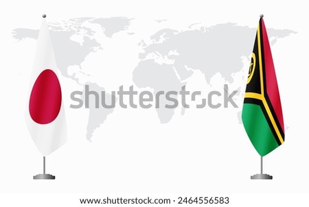 Japan and Vanuatu flags for official meeting against background of world map.