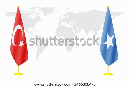 Turkey and Somalia flags for official meeting against background of world map.