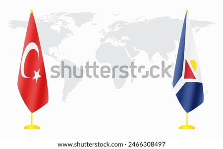 Turkey and Saint Martin flags for official meeting against background of world map.