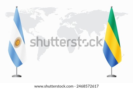 Argentina and Gabon flags for official meeting against background of world map.