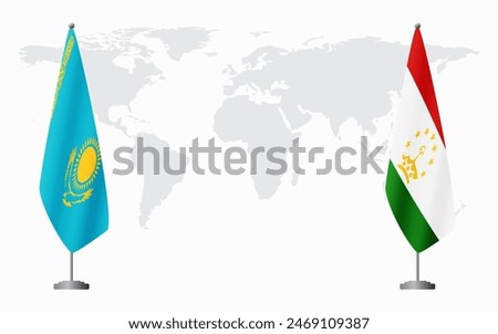 Kazakhstan and Tajikistan flags for official meeting against background of world map.