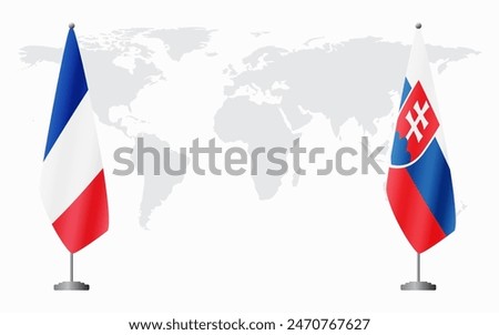 France and Slovakia flags for official meeting against background of world map.