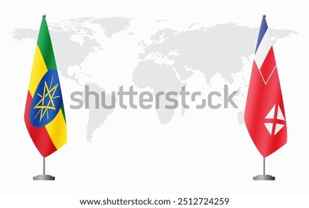 Ethiopia and Wallis and Futuna flags for official meeting against background of world map.