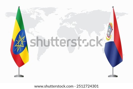 Ethiopia and Sint Maarten flags for official meeting against background of world map.