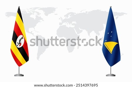 Uganda and Tokelau flags for official meeting against background of world map.