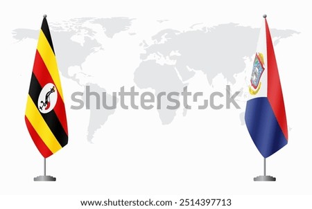 Uganda and Sint Maarten flags for official meeting against background of world map.