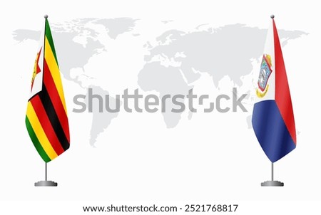 Zimbabwe and Sint Maarten flags for official meeting against background of world map.