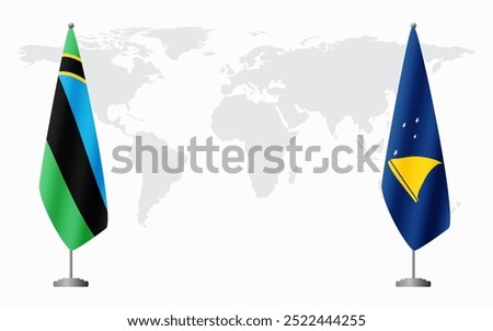 Zanzibar and Tokelau flags for official meeting against background of world map.