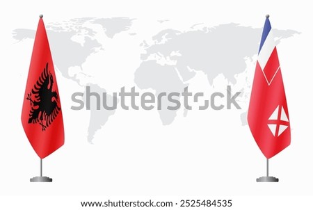 Albania and Wallis and Futuna flags for official meeting against background of world map.