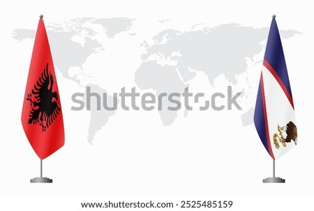 Albania and American Samoa flags for official meeting against background of world map.