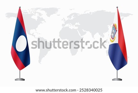 Laos and Sint Maarten flags for official meeting against background of world map.