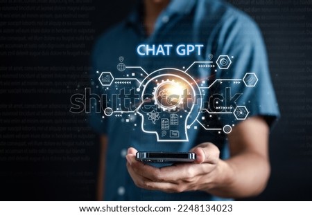 Businessman using chatbot in smartphone intelligence Ai.Chat GPT Chat with AI Artificial Intelligence, developed by OpenAI generate. Futuristic technology, robot in online system. 商業照片 © 
