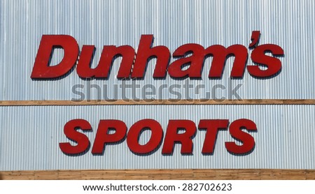 ANN ARBOR, MI - SEPTEMBER 7: Dunham\'s, whose west Ann Arbor store logo is shown on September 7, 2014, has over 200 stores in 19 states