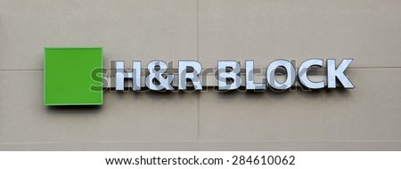 CANTON, MI - DECEMBER 31: H&R Block, whose Canton store logo is shown on December 31, 2014, prepares more than 24.5 million tax returns worldwide,