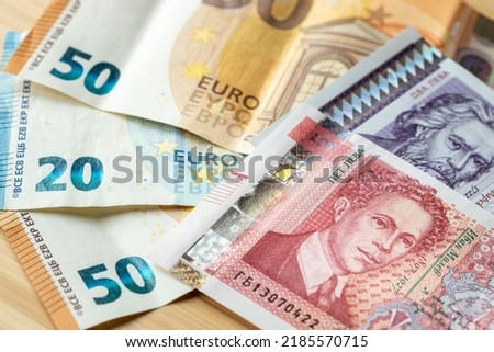 Bulgarian lev next to the common currency of the European Union, the Euro, Concept of Bulgaria accession to the eurozone, economic and political background Photo stock © 