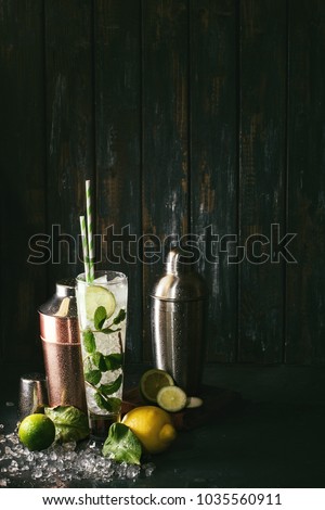 Similar – Foto Bild Zwei Mojito-Cocktails mit gealtertem Rum, Minze und verschiedenen Früchten. Einer mit Erdbeere und der andere mit Passionsfrucht