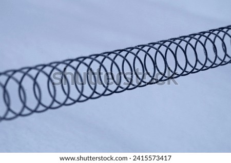 Similar – Tense barbed wire metal