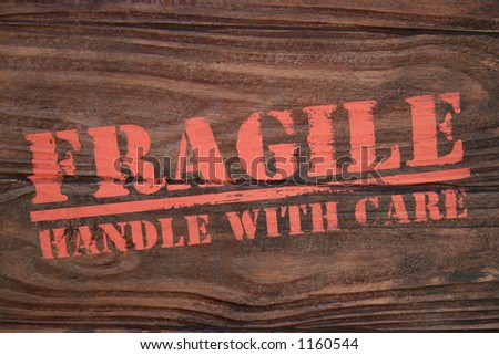 Real photo of wooden box stamped with Fragile handle with care