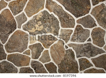 Barrier Wall: Stone Veneer/Reinforced Concrete Block