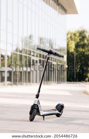 Similar – Image, Stock Photo Parking space for e-scooters and bicycles