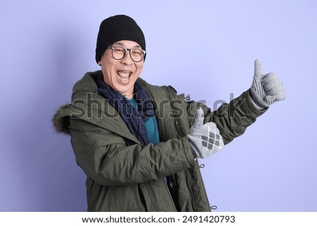 Similar – Image, Stock Photo Man in winter behind a cloud of snow