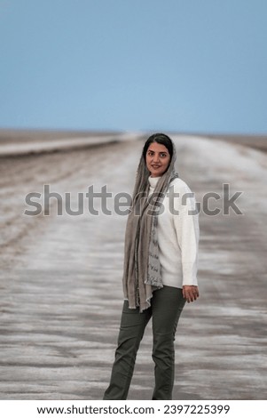 Similar – Image, Stock Photo Persian woman standing outdoors