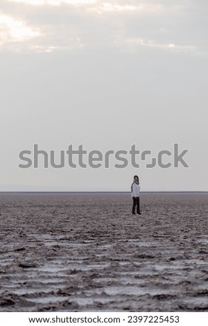 Similar – Image, Stock Photo Persian woman standing outdoors