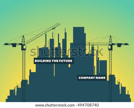 two tower cranes on a background of houses, city and sunset