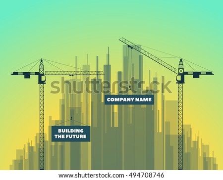 tower cranes on a city background and on sunset