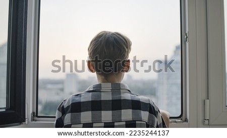 Similar – Image, Stock Photo Child looking through a toy kaleidoscope