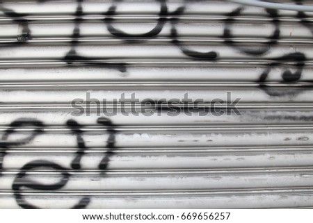 Similar – Image, Stock Photo Graffiti sprayed garage door of a prefabricated garage