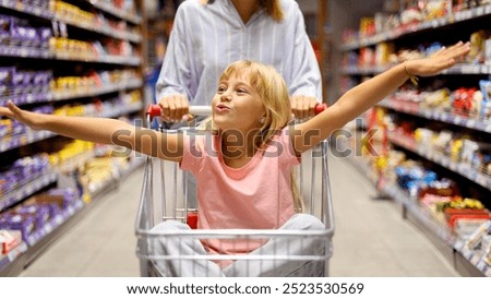 Similar – Image, Stock Photo Little girl having fun in field