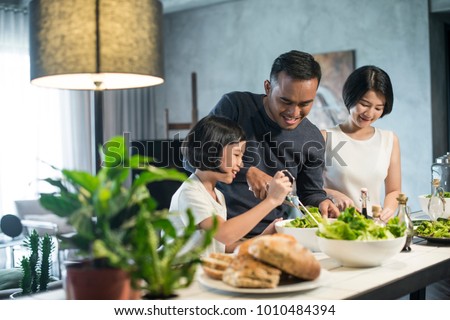 Similar – Image, Stock Photo Growing Family: Parents, Daughter and Expected Second Child