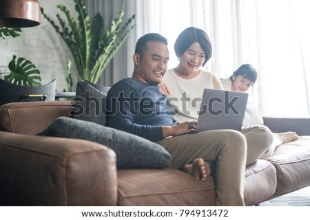 Similar – Image, Stock Photo Growing Family: Parents, Daughter and Expected Second Child