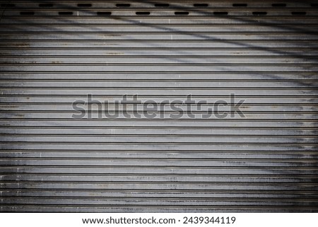 Similar – Image, Stock Photo An old weathered garage door. The blue and white paint is flaking off artfully.