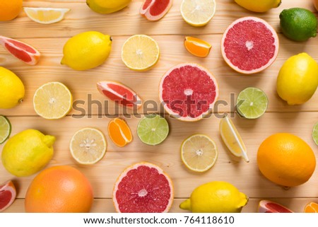 fruit lime, lemon, and grapefruit with vitamin C chopped, lie on a wooden background Stok fotoğraf © 
