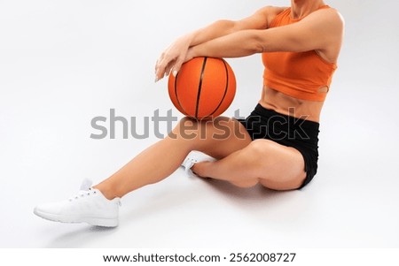 Similar – Image, Stock Photo Slim sportswoman with basketball on stairs