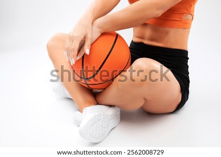 Similar – Image, Stock Photo Slim sportswoman with basketball on stairs