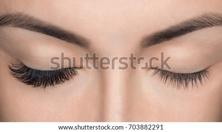 Eyelash removal procedure close up. Beautiful Woman with long lashes in a beauty salon. Eyelash extension. Stockfoto © 