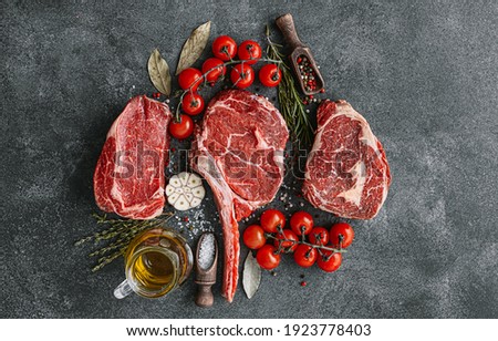 Fresh raw Prime Black Angus beef steaks. Variety of raw beef meat steaks for grilling.