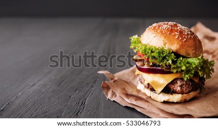 Similar – Image, Stock Photo homemade hamburgers on rustic wood