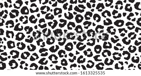 Seamless leopard fur pattern. Fashionable wild leopard print background. Modern panther animal fabric textile print design. Stylish vector black and white illustration