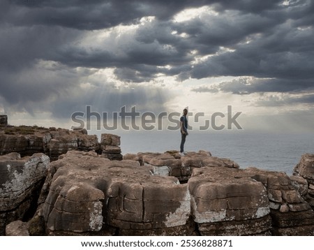 Similar – Image, Stock Photo Majestic cliffs of ocean coastline in sunset