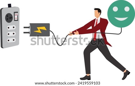 Businessman holding an electric plug pulled out from the socket
