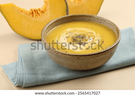 Similar – Image, Stock Photo Tasty pumpkin soup in bowl on table