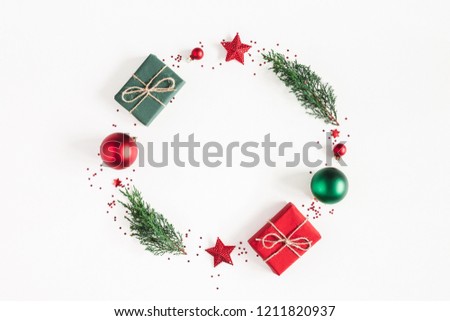 Similar – Image, Stock Photo Christmas composition. Wreath made of fir tree branches and festive pine cones on a red background, top view