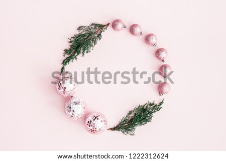 Similar – Image, Stock Photo Christmas composition. Wreath made of fir tree branches and festive pine cones on a red background, top view