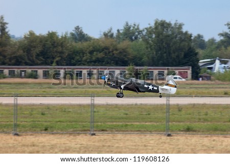 ZHUKOVSKY, RUSSIA - AUG 11: Retro aviation, American Curtiss P-40 Warhawk during 100th anniversary of Russian air force on August, 11, 2012 at Zhukovsky, Russia. that first flew in 1938