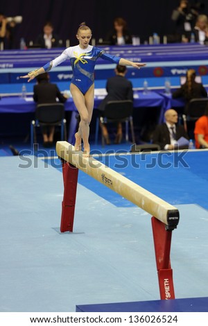 MOSCOW - APR 19: 2013 European Artistic Gymnastics Championships.  Vasylieva Olena - Ukrainian gymnast performs on the balance beam in Olympic Stadium on April 19, 2013 in Moscow, Russia.
