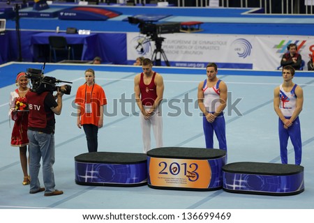 MOSCOW - APR 19: 2013 European Artistic Gymnastics Championships. Winners of Pommel Horse - Daniel Keatings, Krisztian Berki and Max Whitlock in Olympic Stadium on April 19, 2013 in Moscow, Russia
